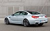 2014-BMW-M6-Gran-Coupe-rear-three-quarters-static.jpg